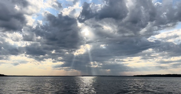 Find sermons on YouTube from Cass Lake Alliance Church. Photo is a picture of a Lake with partly cloudy and sunny sky